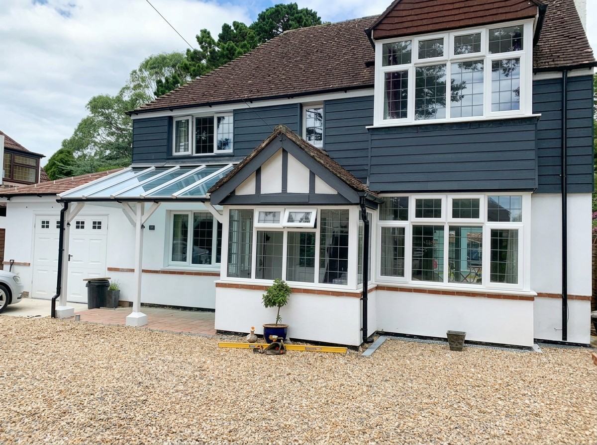 Modern single-storey rear extension with bi-fold doors completed in West Sussex