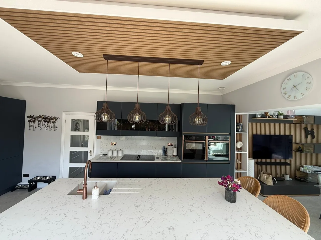 Newly fitted contemporary kitchen with island and quality finishes in West Sussex home