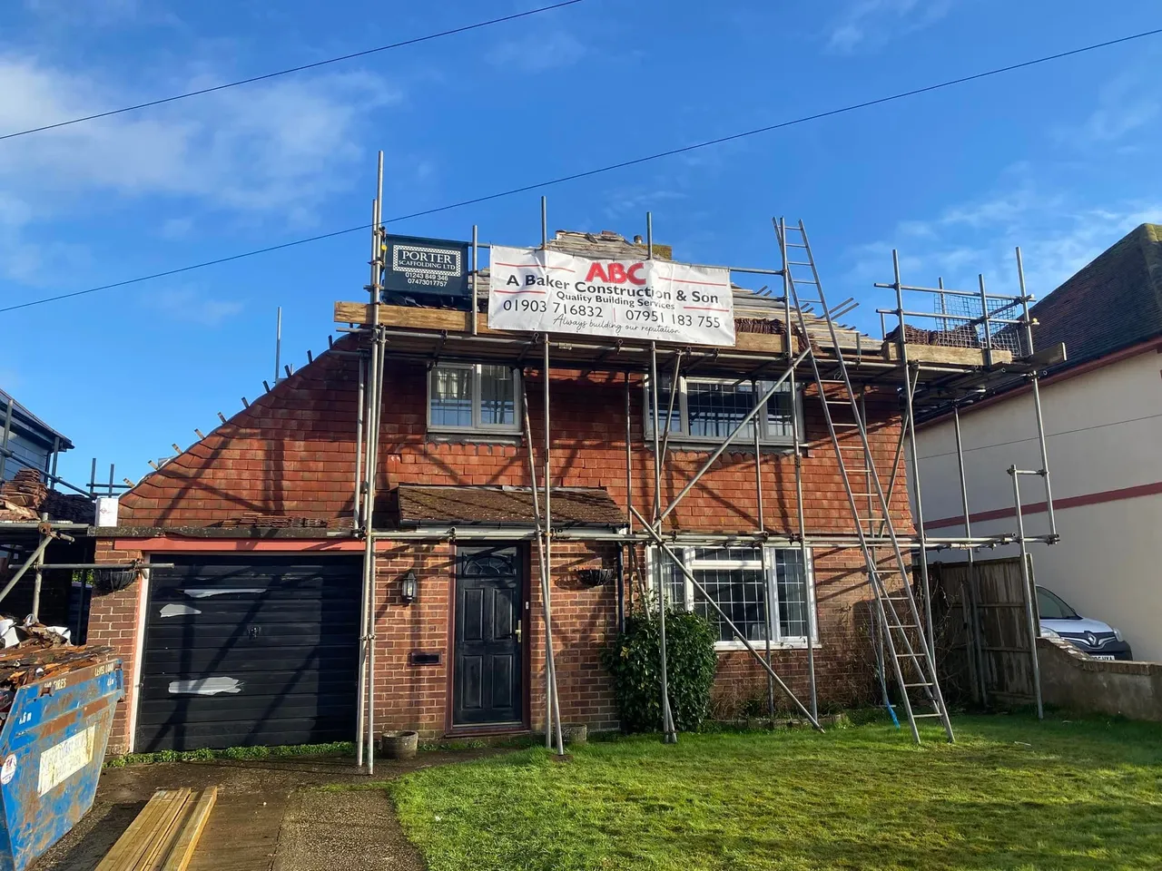A Baker Construction & Son team carrying out a roof replacement on a West Sussex home